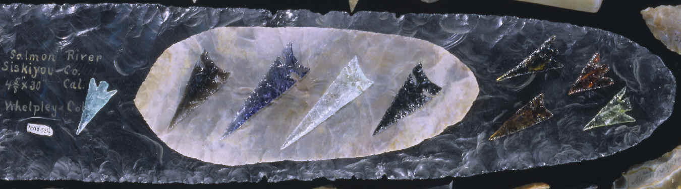 Ishi points & glass points from California laying on large blade.