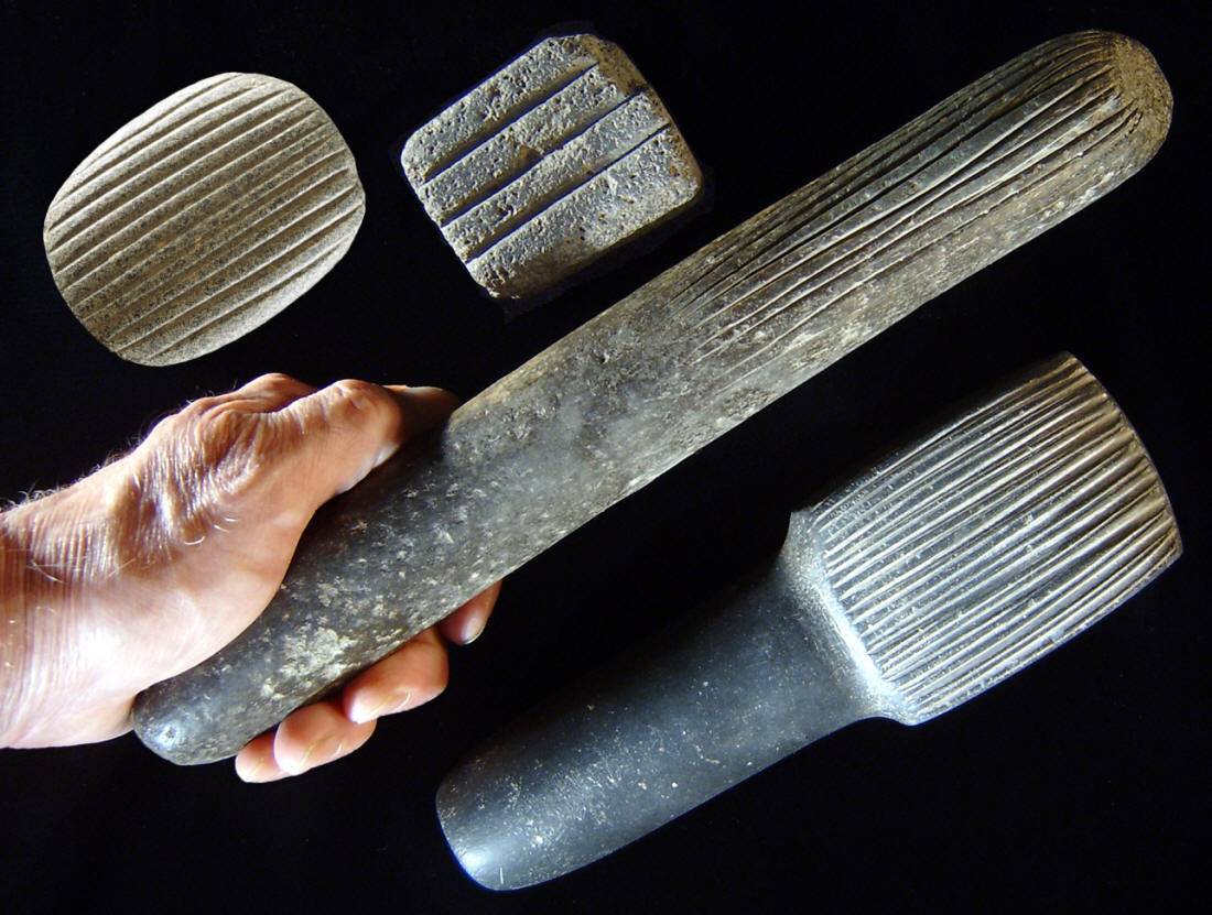 Four stone bark beaters from four different countries.