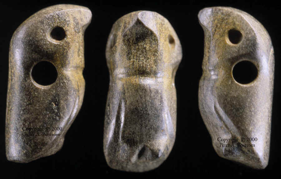 Three views of a Poverty Point bird effigy stone bead.