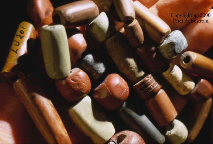 A handful of Poverty Point stone tubular beads.