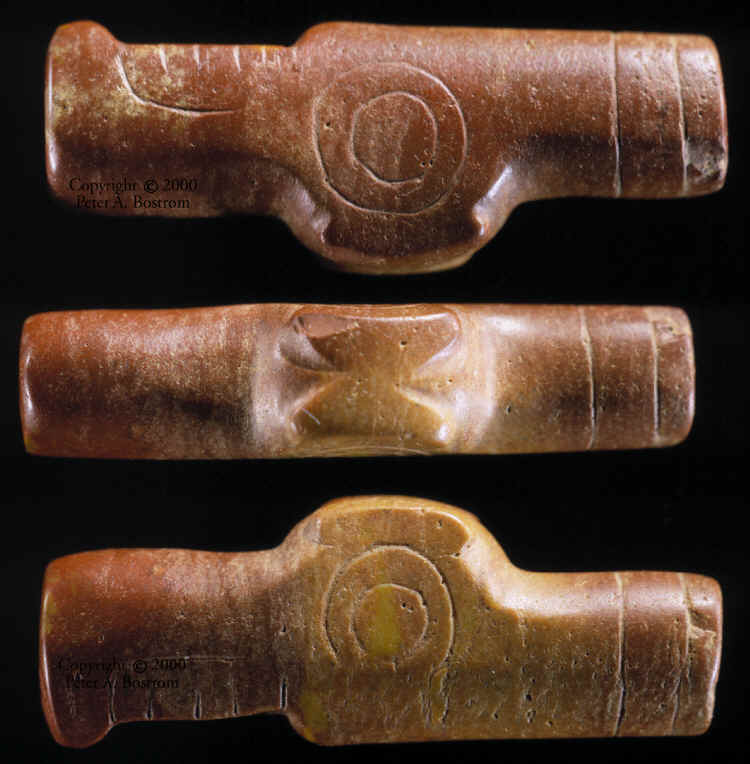 Three views of turkey vulture Poverty Point bead.