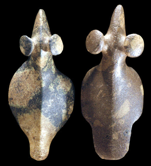 Two "popeye" birdstones.