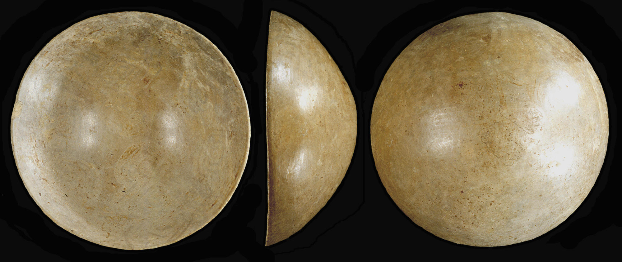 Three views of a negative painted cup from Illinois.