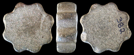 Eight-notch cogged stone from southern California.