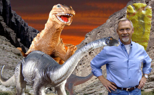 Dan Theus with dinosaurs and a point he made.