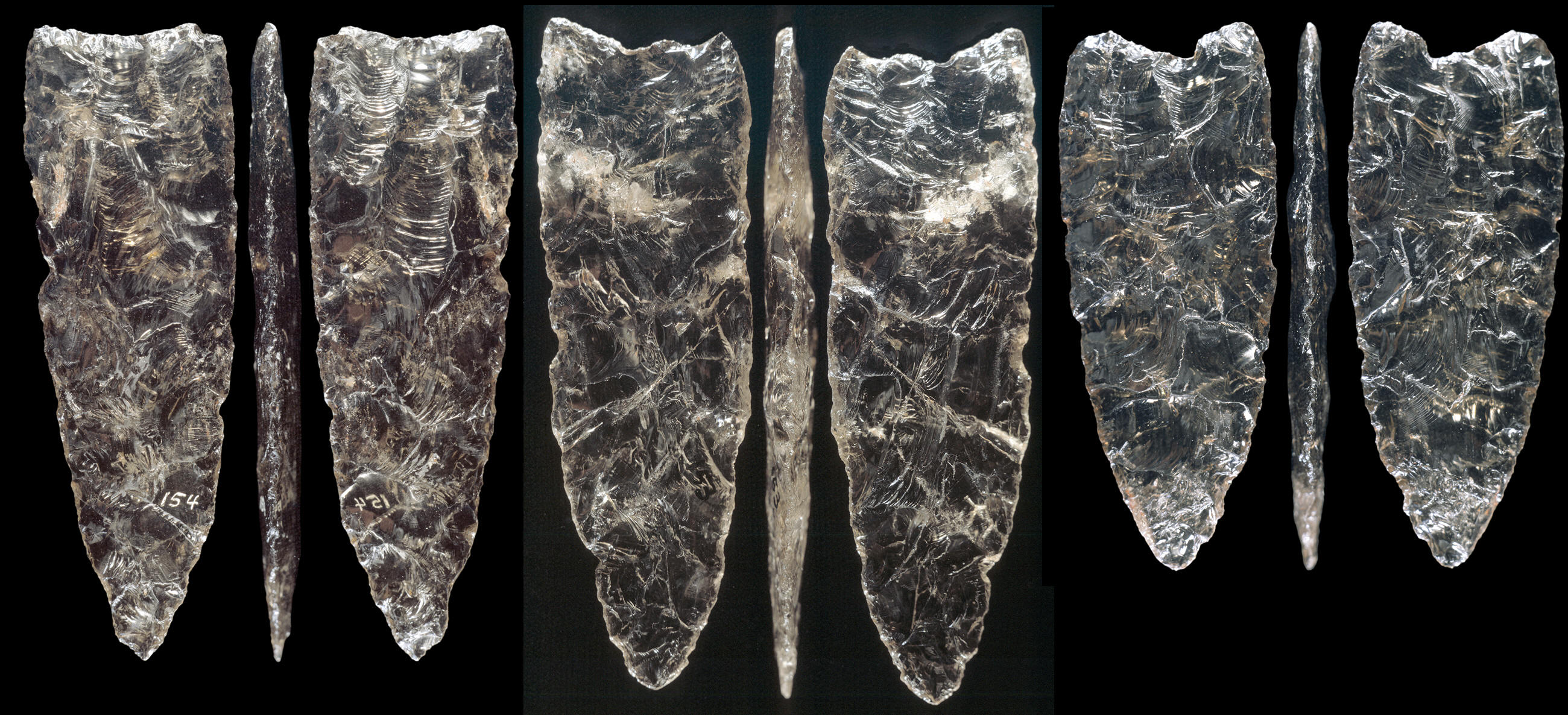 Three quartz crystal Clovis points from the Fenn cache.