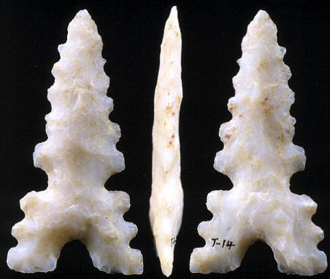 A rare triple-notched serrated white Kaolin "gem point."