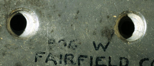 Closeup view of holes on slate gorget from Ohio.