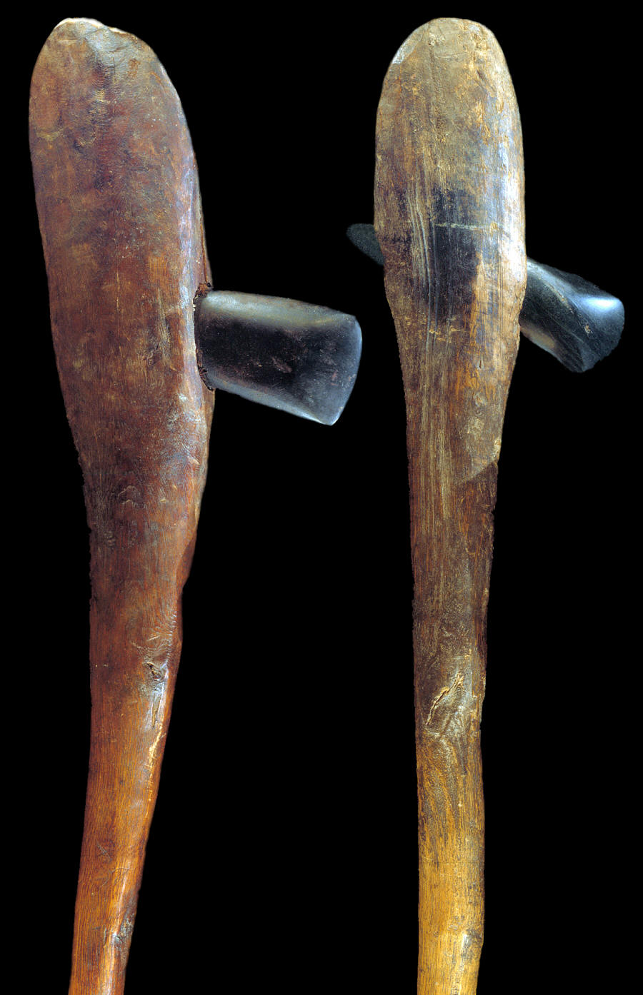 Two hafted axes from Irian Jaya, New Guinea.