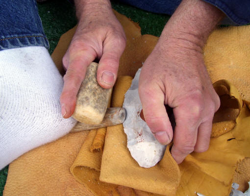 Mike Dothager removing flake with indirect percussion.