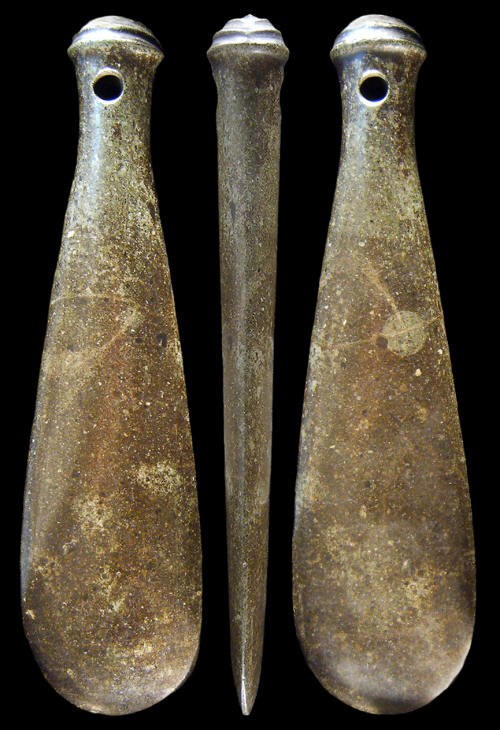 Three views of a dark-stone Maori fighting "club."