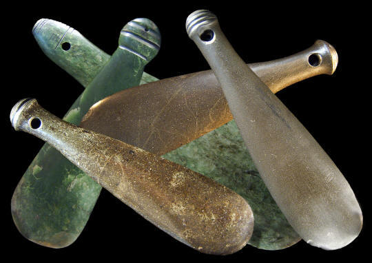 Group of five different Maori stone fighting "clubs."