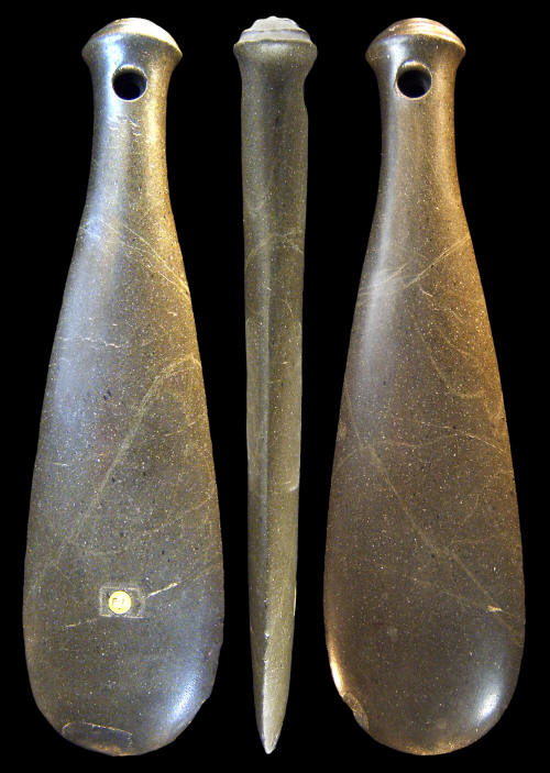 Three views of a dark-stone Maori fighting "club."