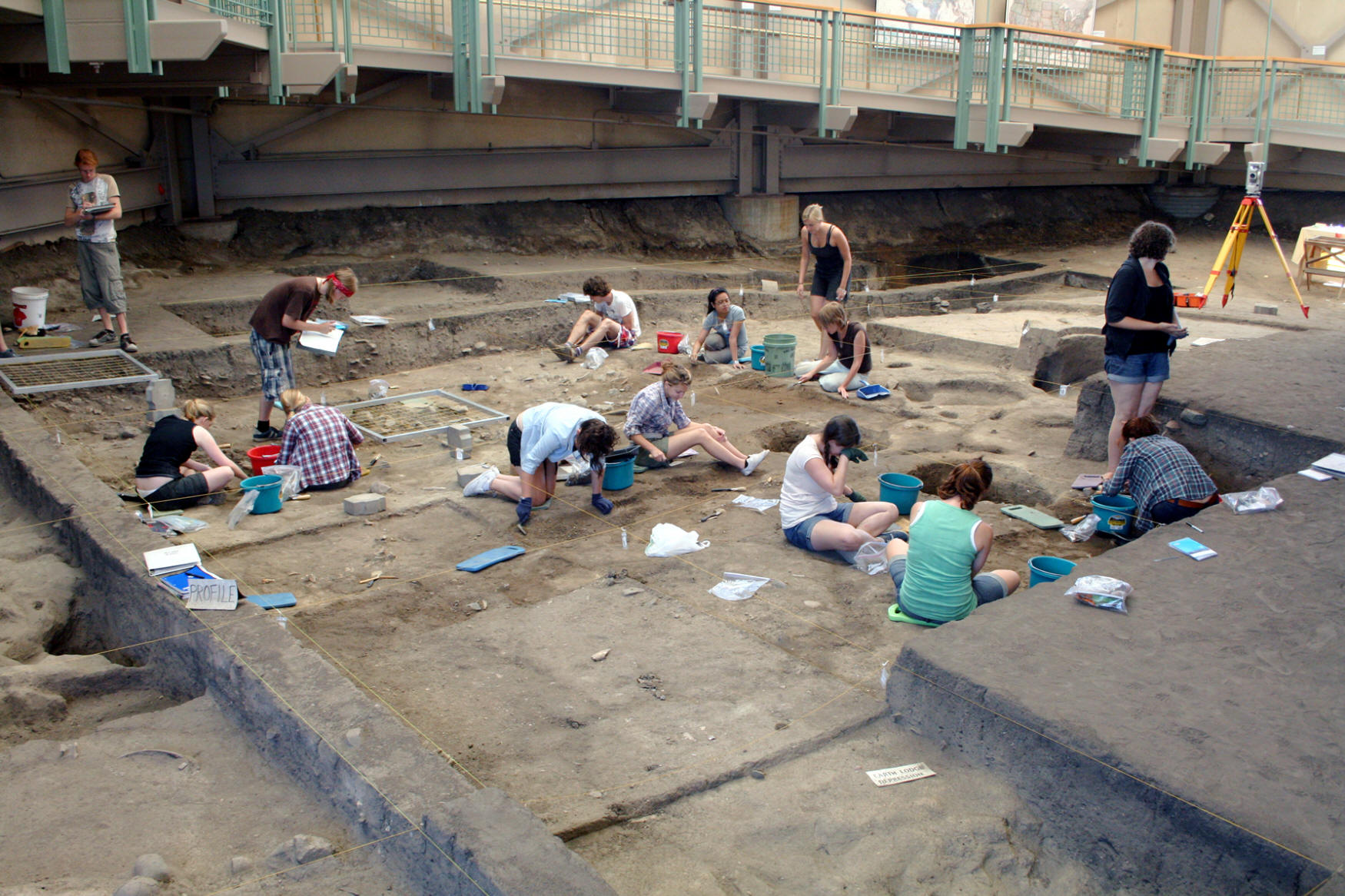 Augustana College students excavating in Archeodoome.
