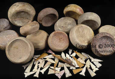 Discoidals, Cahokia points and harpoon from mound 72.