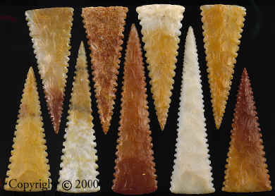 9 serrated unnotched Cahokia points from mound 72.