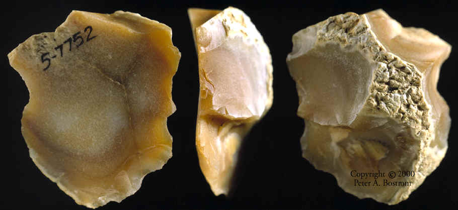 Three views of an Oldowan Flake Tool from Olduvai Gorge.