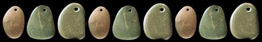 Row of pebble pendants from southern Illinois.