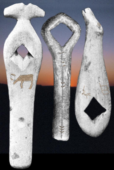 Three pierced staffs from different sites in Alaska.