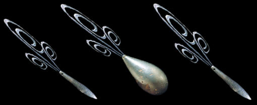 Abstract image of three hematite plummets.