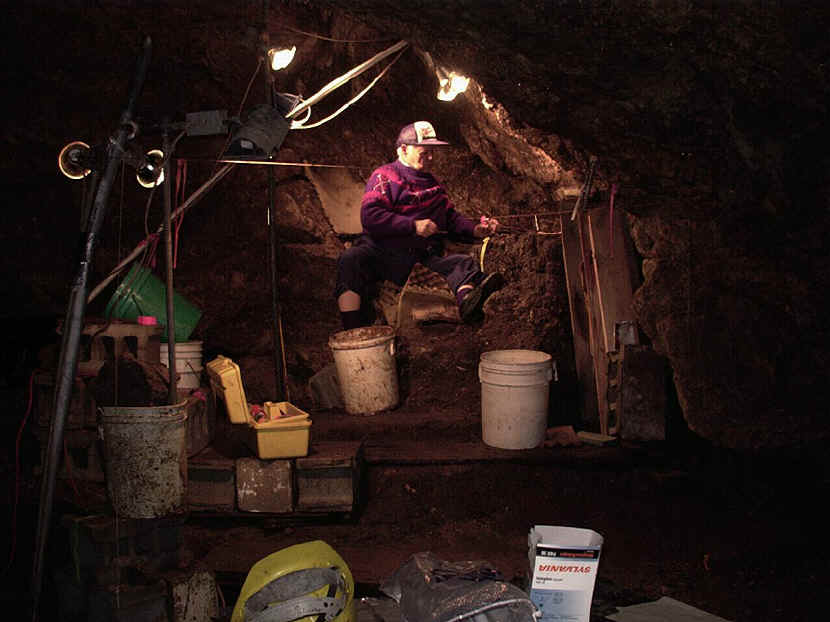 View of excavation inside Sheriden Cave with plenty of lights.