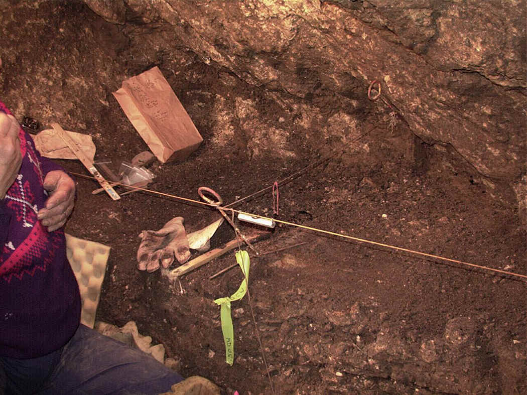 Excavating inside Sheriden Cave.