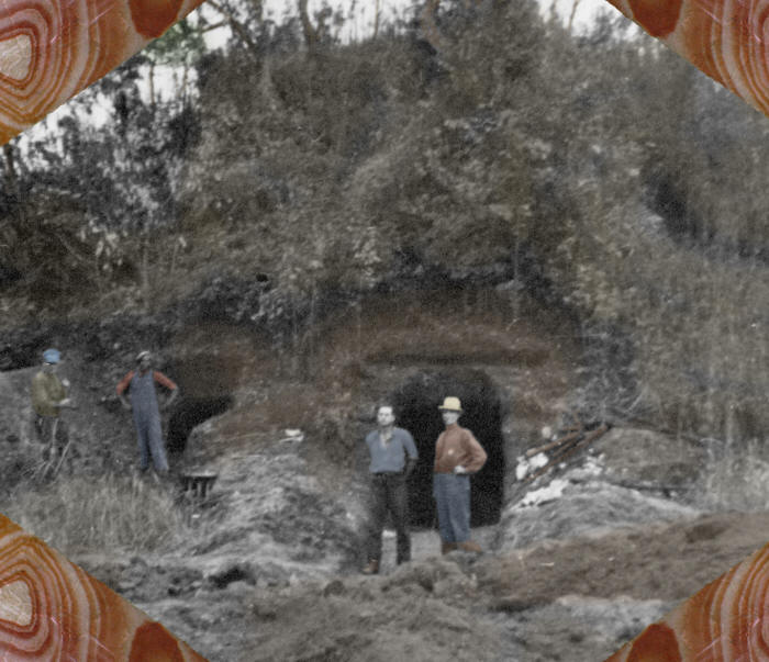 Pocola Miners at entrance to central mortuary tomb, Craig.