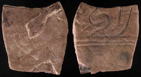 Wilson tablet showing plain and engraved sides.