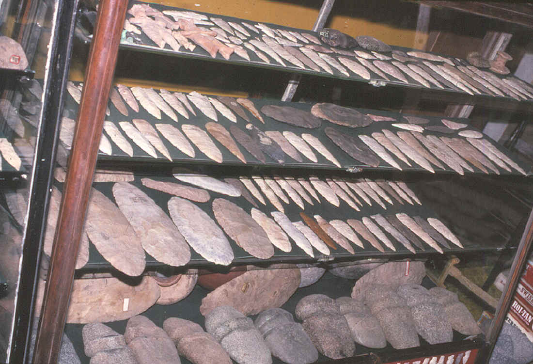 Cabinet full of artifacts in an Illinois collection.