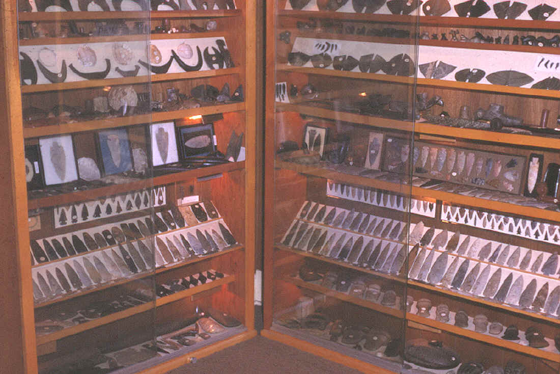 Two cabinets full of artifacts from the Wachtel colleciton.