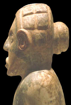 Left side view of Etowah male statue.