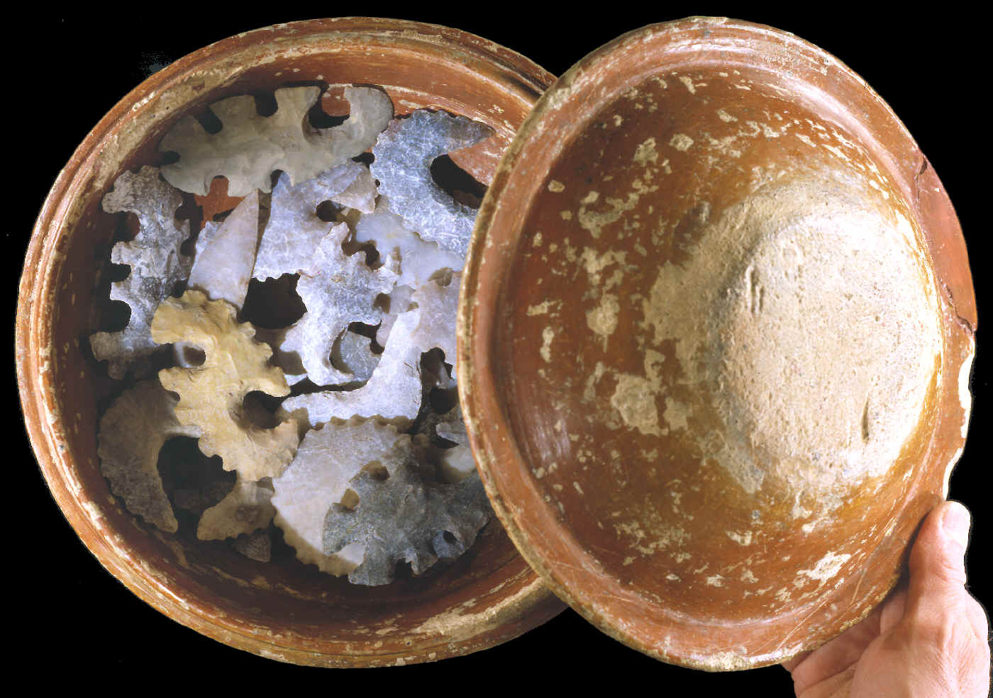 Mayan eccentric flint cache of 26 eccentrics with container.