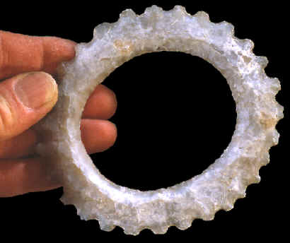 Mayan serrated ring eccentric.