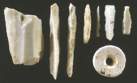 Examples of micro-drill stages of manufacture plus drilled bead.