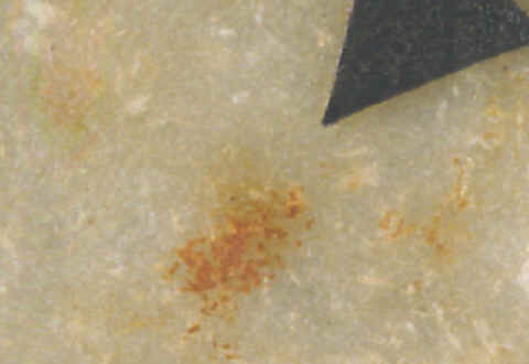 Red ochre on surface of largest Neralich cache point.