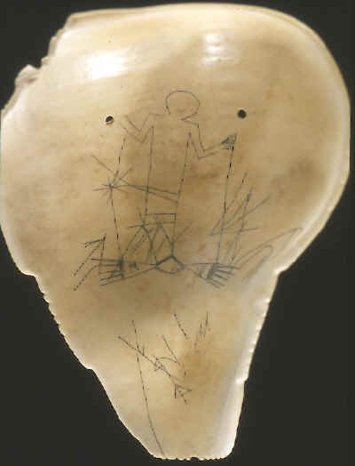 Engraving on the back of a shell mask from South Dakota.