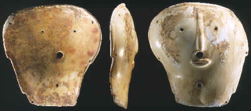 A marine shell mask from Montana, three views.