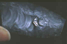 Polished surface on Vail fluted point.