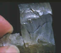 Polished surface on Vail fluted point.